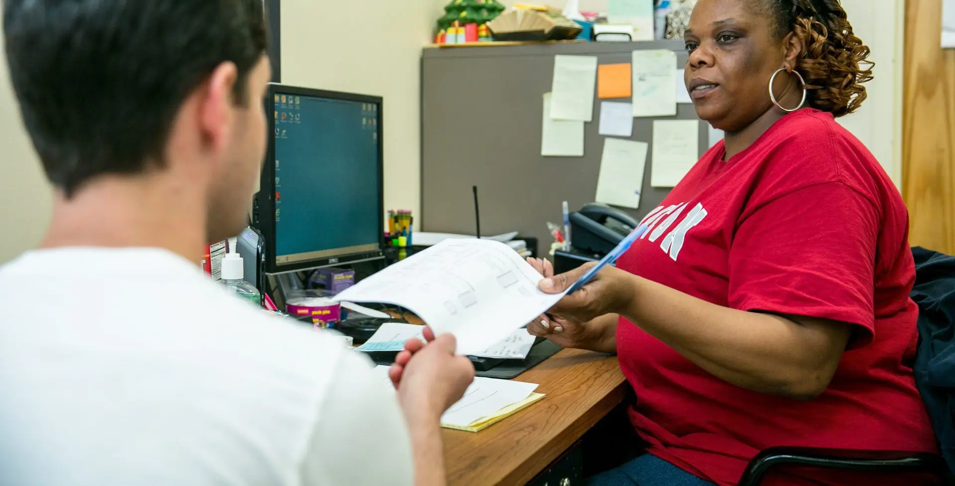 Case manager helping a guest