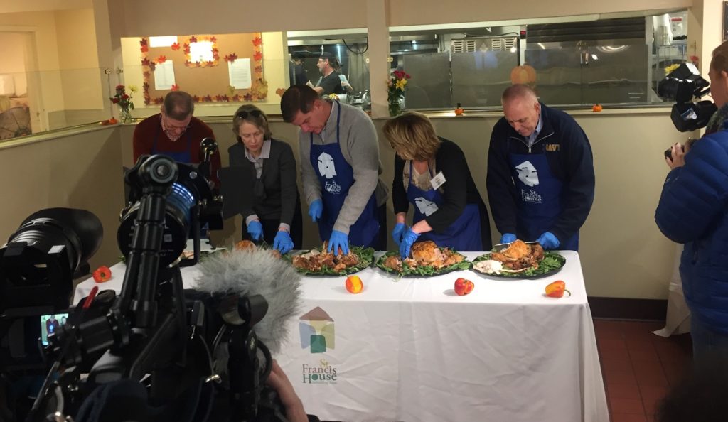 Mayor Walsh, City Councilor-elect Flynn carving turkeys Thanksgiving 2017