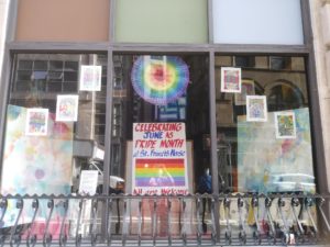 Art on display in St. Francis House's window to celebrate pride month. 