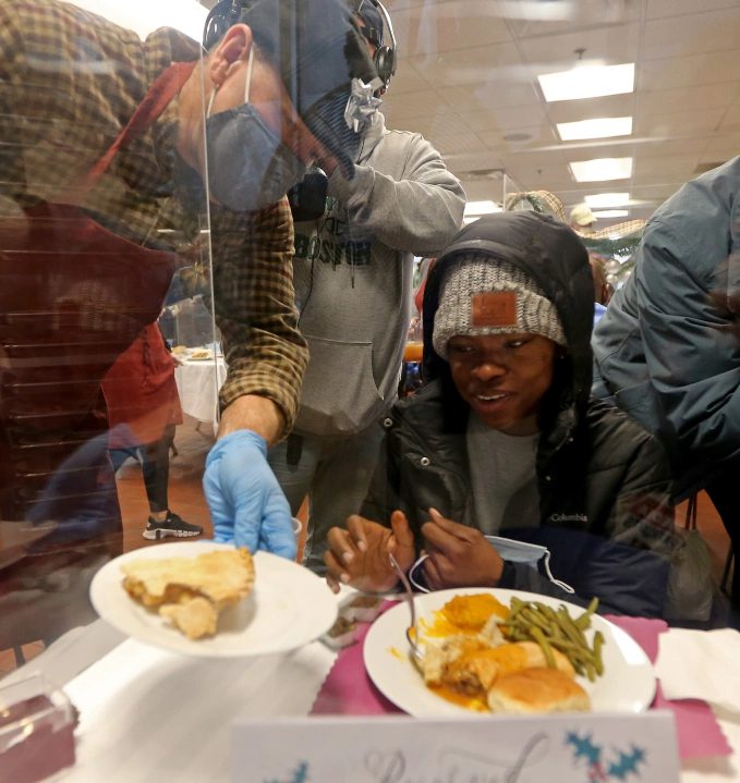 interior Boston Herald: Boston’s St. Francis House serves hundreds of meals to those in need on Christmas, despite fewer volunteers amid COVID-19 banner image