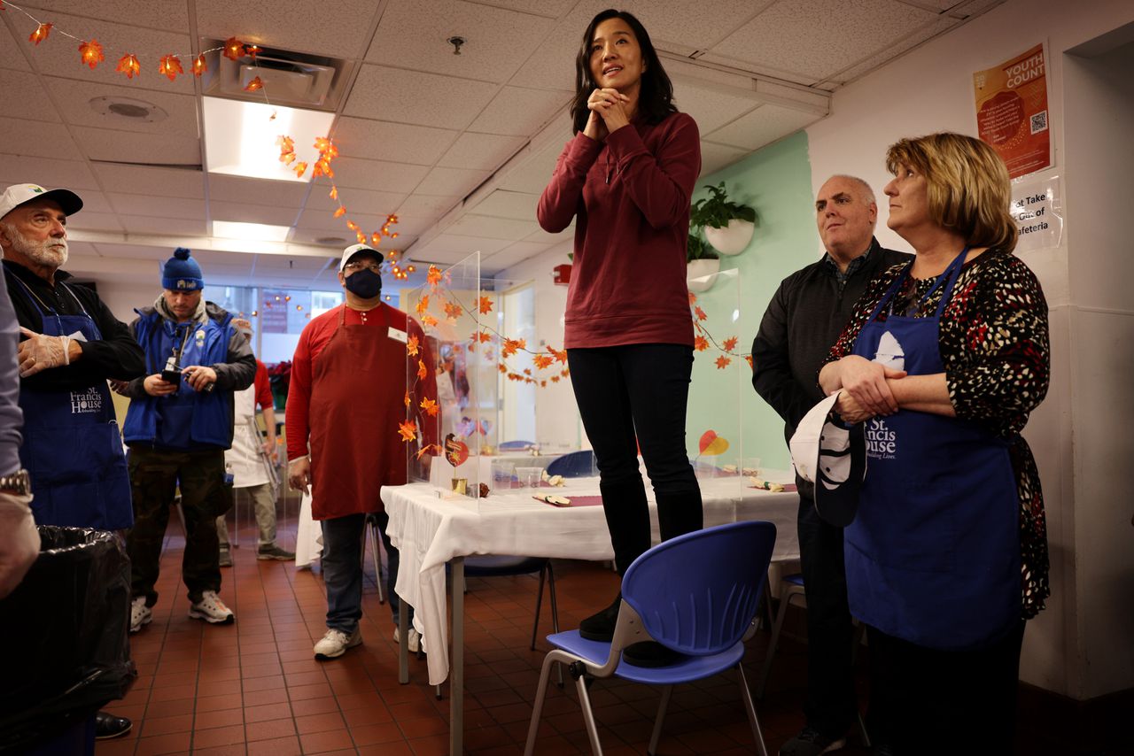 interior Boston Globe: City and state officials help celebrate Thanksgiving at Boston’s Pine Street Inn banner image