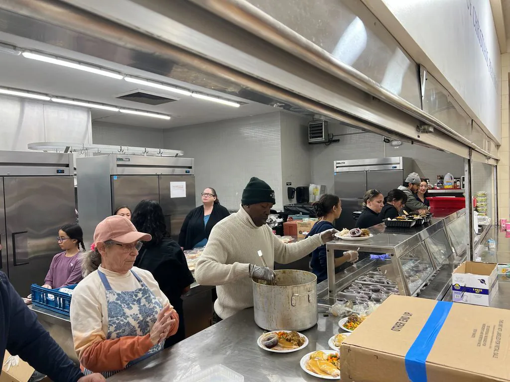 interior From The Boston Globe: On Thanksgiving, Boston-area homeless shelters serve moments of community banner image